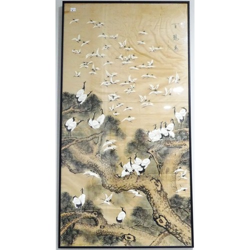 268 - A 20th century Japanese embroidered picture, depicting a stork, 42cm x 77cm, framed, together with a... 