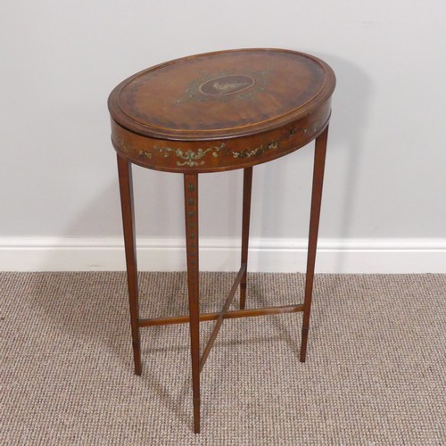 403 - An Edwardian Sheraton revival satinwood and painted oval Work Table, the hinged top, opening to reve... 