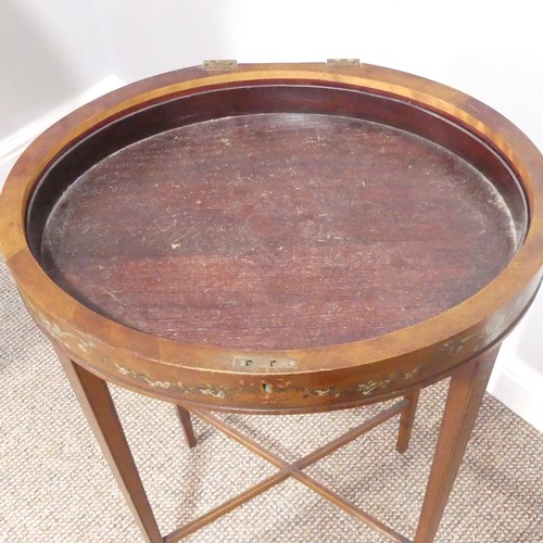 403 - An Edwardian Sheraton revival satinwood and painted oval Work Table, the hinged top, opening to reve... 