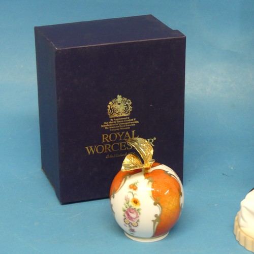 154 - A Royal Worcester cased Connoisseur Collection 'Peach' Candle Snuffer, together with a Royal Worcest... 