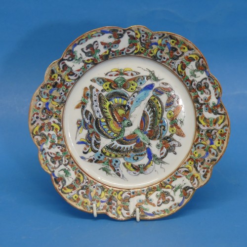 74 - An early 20thC Chinese famille rose butterfly pattern Plate, decorated profusely in the Chinese Fami... 