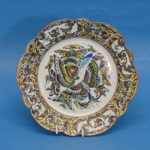 74 - An early 20thC Chinese famille rose butterfly pattern Plate, decorated profusely in the Chinese Fami... 