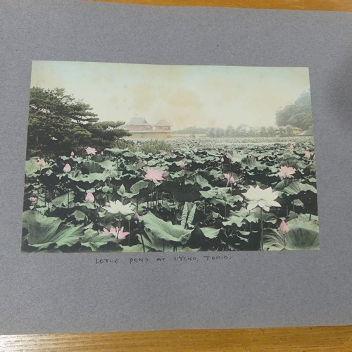 215 - An album of early 20th century Japanese tinted photographs, depicting places, rural scenes, traditio... 