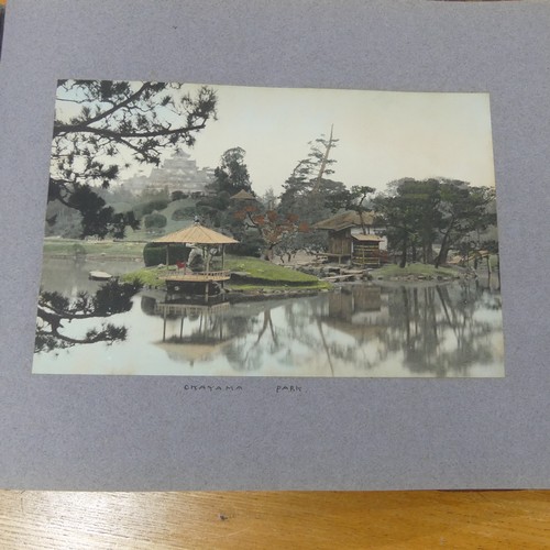 215 - An album of early 20th century Japanese tinted photographs, depicting places, rural scenes, traditio... 