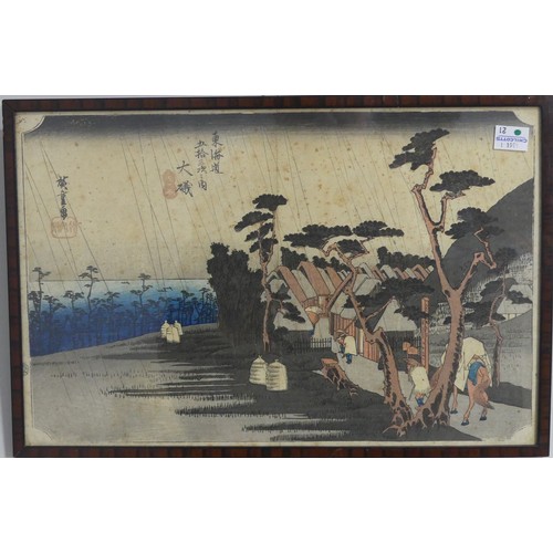 196 - A pair of early 20th century Japanese woodblock prints, depicting figures in landscapes, 23cm x 35cm... 