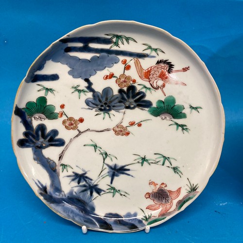 174 - A 19thC oriental porcelain Plate, decorated in depictions of prunus branches, cranes, turtles, etc, ... 