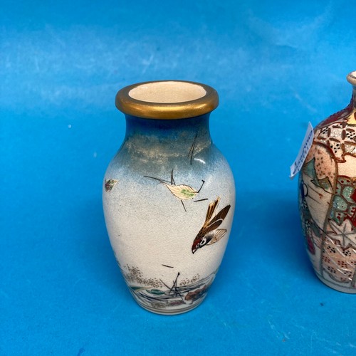 178 - A miniature Japanese Kutani Vase, depicting exotic birds, with character mark to base for Dai Nippon... 