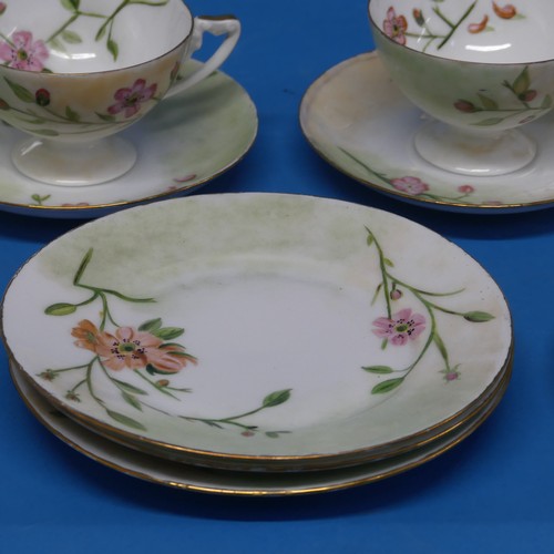 87 - An early 20thC Rosenthal hand-painted Tea Service, comprising six Cups, six Saucers and five Plates,... 