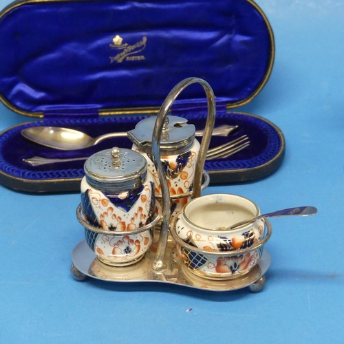 132 - A silver plated and Imari Cruet Set, with silver mustard spoon, together with a cased silver spoon a... 