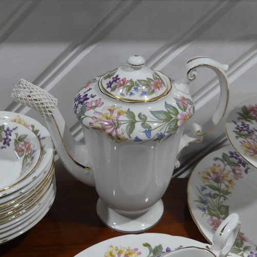 122 - An extensive Paragon Bone China 'Country Lane' Dinner, Tea and Coffee Service, to include Cake Stand... 