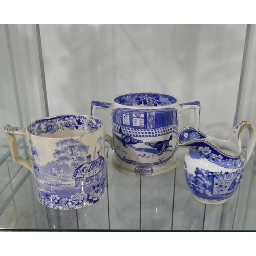 187 - A small quantity of blue and white Delft, to include a lidded pot modelled as a lady, a pot flanked ... 