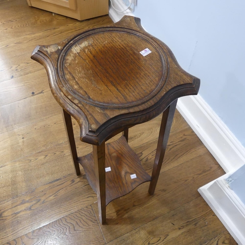 329 - An Arts and Crafts oak Torchere/Plant Stand, with an under tier, some water damage, 39cm wide x 39cm... 