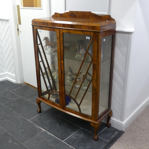 330 - An Art Deco walnut Display Cabinet, with sunburst glazing bars, the two somewhat bowed glazed doors ... 