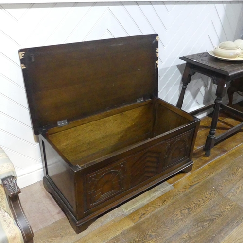 386 - An early 20thC oak Blanket Box, with incised panel front, vacant interior, 100cm wide x 50cm deep x ... 