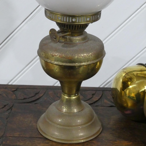 394 - A set of three vintage hanging Scales, the brass bodies with brass bowls, together with a vintage br... 