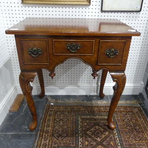 412 - A good quality reproduction burr walnut Lowboy, in the Georgian style, with stringing to the top, ra... 