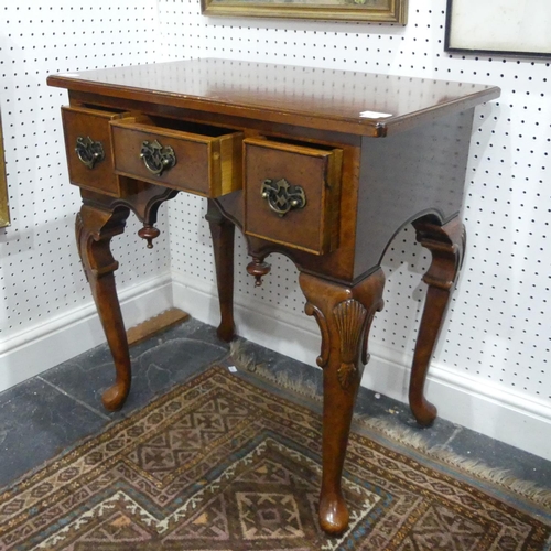 412 - A good quality reproduction burr walnut Lowboy, in the Georgian style, with stringing to the top, ra... 