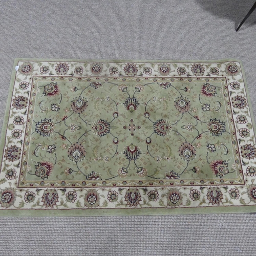 414 - A modern, good quality wool pile pale green machine-made Hearth Rug, 102cm x 160cm.