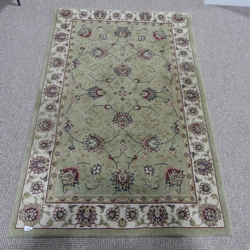 414 - A modern, good quality wool pile pale green machine-made Hearth Rug, 102cm x 160cm.