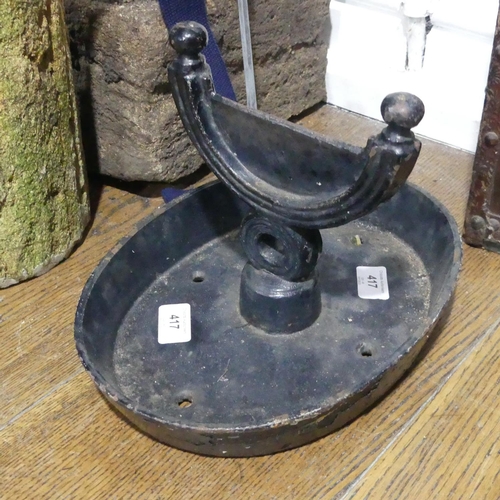 417 - An antique cast iron Boot Scraper, painted in black, 30cm wide x 21cm high.