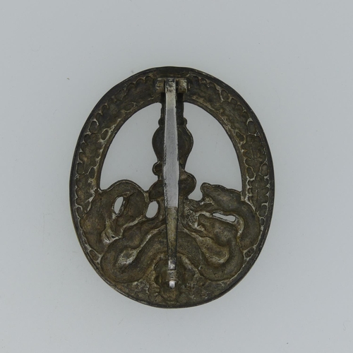 5 - A German WW2 period Anti-Partisan Badge, the hydra with three pierced holes, the reverse with flat p... 