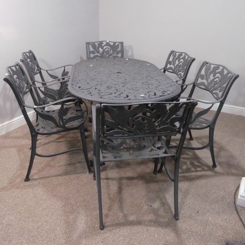 629 - A cast metal Garden Table and six Chairs, painted in grey, with pierced foliate decoration, 160cm lo... 