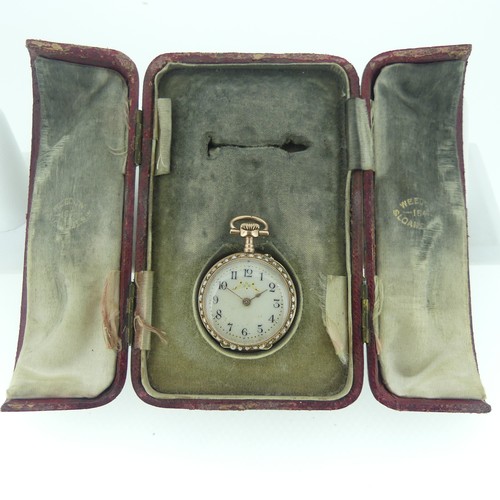 113 - A pretty Swiss 14ct gold and enamel Fob Watch, case and cuvette marked 