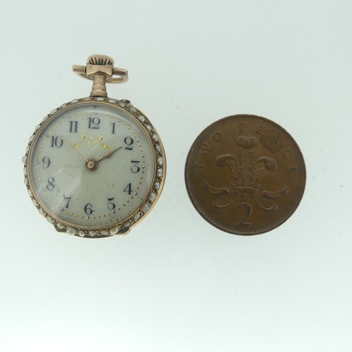 113 - A pretty Swiss 14ct gold and enamel Fob Watch, case and cuvette marked 