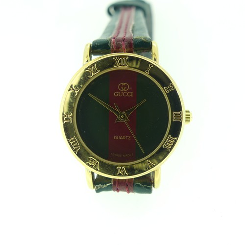 123 - An Art Deco gold-plated Hunter Pocket Watch, and three lady's gold-plated wristwatches: Gucci quartz... 