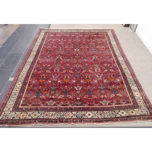 627 - Tribal Rugs; a large Hamadan hand-knotted rug, wool pile on cotton base, the red ground with stylise... 