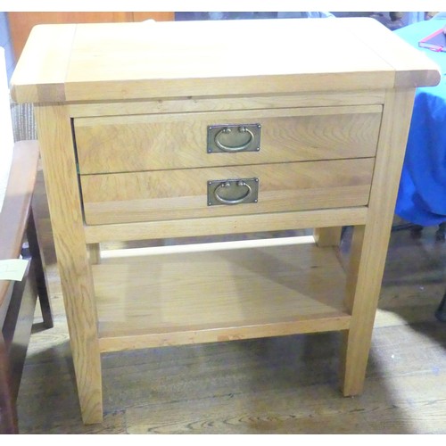 580 - A Modern oak two-drawer side Table W 75cm x H 86cm x D 37cm.