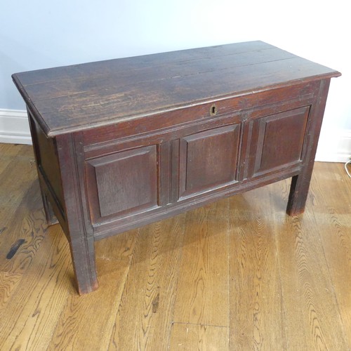 583 - An 18thC three panel oak Coffer, reeded exterior, interior drawer and original hinges raised on stil... 