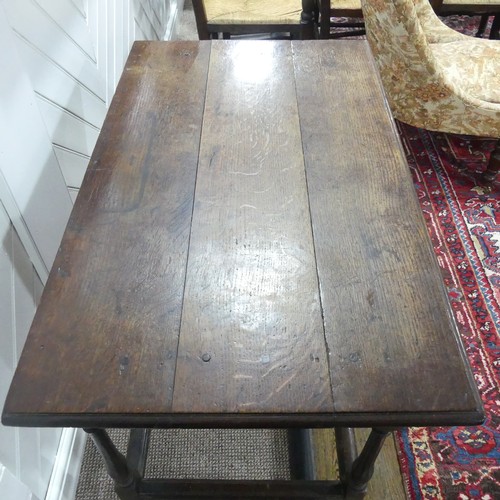 584 - An 18thC oak Side Table, with single frieze drawer, turned legs joined by stretchers W 96cm x H 72cm... 