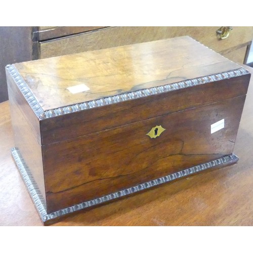 589 - A Georgian rosewood Tea Caddy, moulded edges, interior with twin lidded compartments, working lock a... 