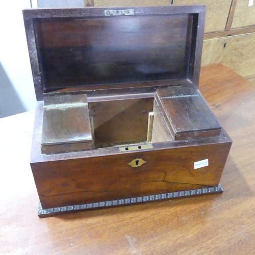 589 - A Georgian rosewood Tea Caddy, moulded edges, interior with twin lidded compartments, working lock a... 