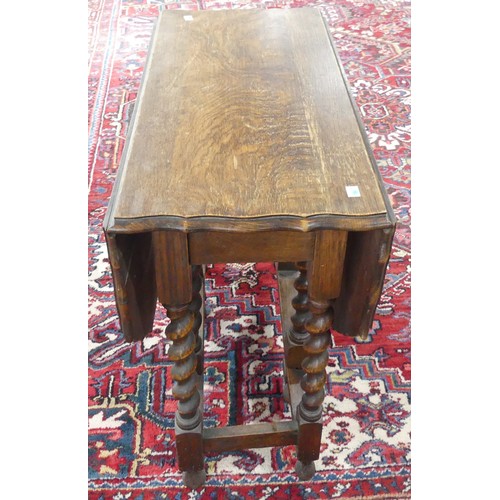 592 - An Edwardian oak gateleg Table, with shaped edges and barley twist supports, W 37cm (116cm extended)... 