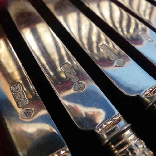 71 - A cased set of twelve Edwardian silver and mother of pearl Dessert Knives and Forks, by Martin, Hall... 