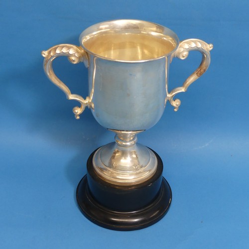 77 - A George V silver two handled Trophy Cup, hallmarked Birmingham, 1933, of goblet form with leaf capp... 