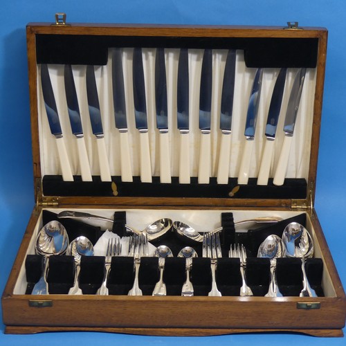 87 - A canteen of matched silver fiddle pattern Flatware, 19thC halllmarks including six serving spoons, ... 