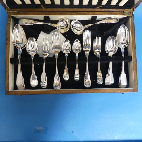 87 - A canteen of matched silver fiddle pattern Flatware, 19thC halllmarks including six serving spoons, ... 