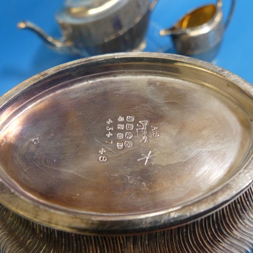 74 - An antique silver plated three-piece Tea Set, together with plated back Hand Mirror, etc, seven piec... 