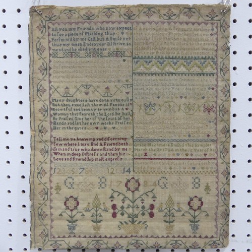 597 - A George III Sampler, dated 1748, with several passages, the frame a/f, together with a William IV s... 