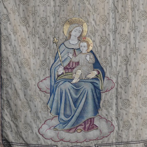 612 - Ecclesiastical interest; a 19thC church pennant depicting Madonna and Child, fabric worn and faded, ... 