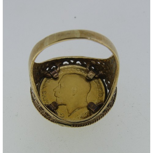 89 - A George V gold half Sovereign, dated 1911, in 9ct gold ring mount with pierced decoration, ring siz... 