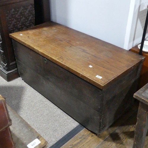 602 - An early 20thC carved oak side Table, W 74cm x H 60cm x D 53cm, together with a plain oak coffer... 