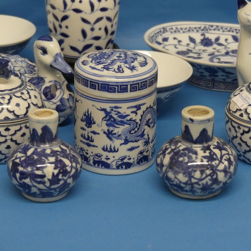 148 - A quantity of modern Chinese blue and white porcelain Wares, to include a Jar and cover, decorated i... 