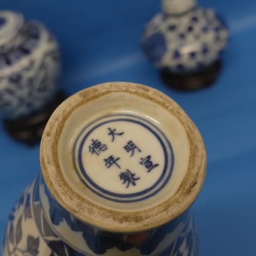 149 - A Chinese blue and white porcelain Vase, with apocryphal Xuande mark to base, together with a Chines... 