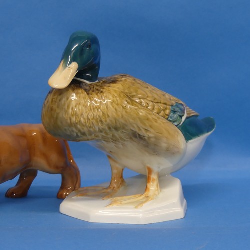 9 - A Beswick figure of a Duck, numbered 817, together with a Beswick Sausage Dog and a Beswick Fox (3)... 