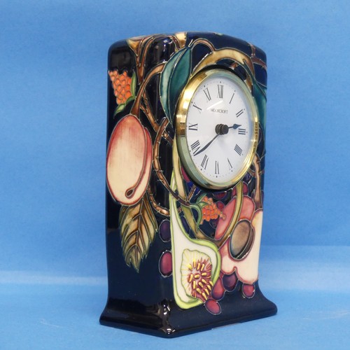 35 - A Moorcroft pottery 'Queen's Choice' pattern Mantel Clock, designed by Emma Bossons, dated 2000, H 1... 