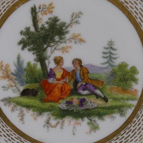 66 - A near pair of continental porcelain Cabinet Plates, each decorated centrally with classical scenes,... 